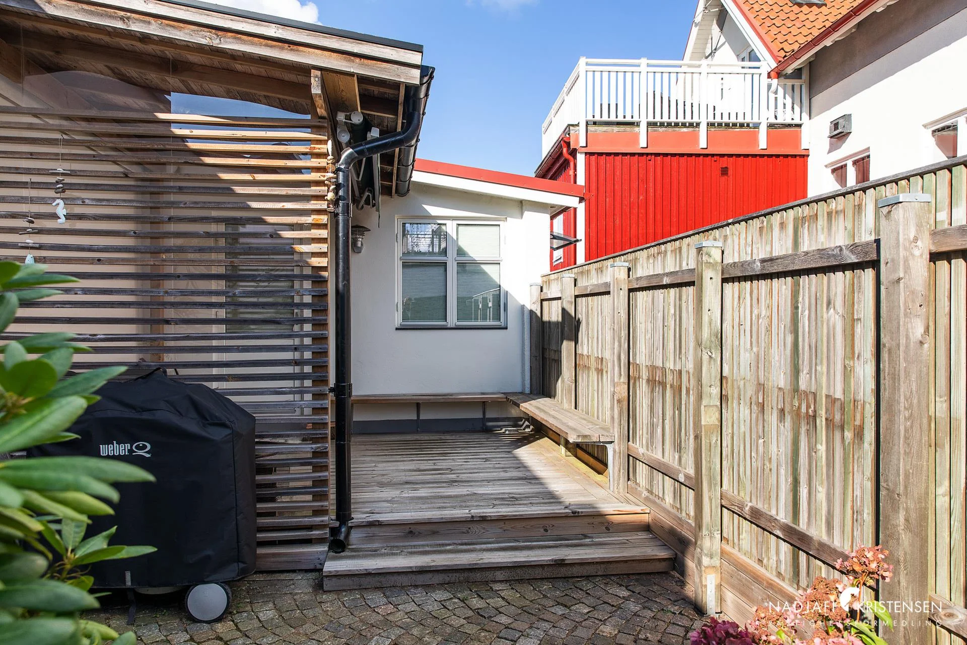 Välskött hyresfastighet med 5 lägenheter och gårdshus i centrala Båstad